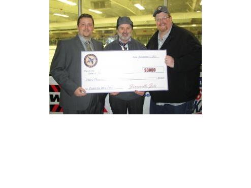 JETS donate $3000 from Paint the Rink Pink