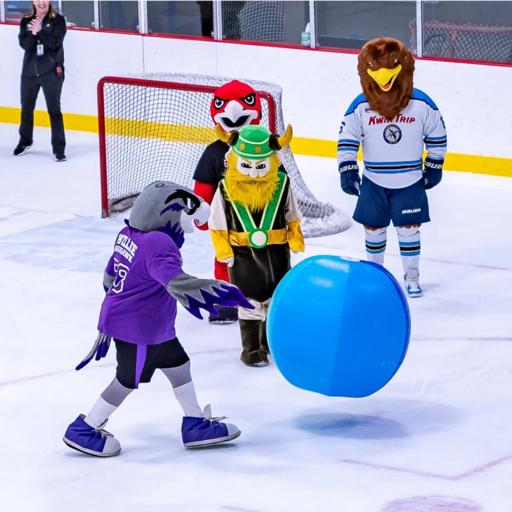 Mascots playing hockey